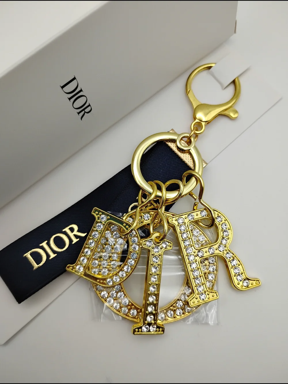 Dior Gold Crystal 'D I O R' Logo Keychain with Black Ribbon BNIB